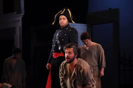 Javert (L- Renwick Anson Paige II) and Jean Valjean (JP Sisneros). Photo courtesy of Montgomery College Summer Dinner Theatre.