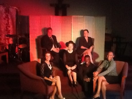 The cast of ‘Masquerade.’ L to R: Sarah Scott (Kelli), Tim Jansen (Steven), Carol V. Calhoun (Center) (Emma), Lauren Giglio (Janet), Alie Kamara (Kyle), and Kelly Richards (Pastor Diana). Photo courtesy of Wolf Pack Theatre Company.