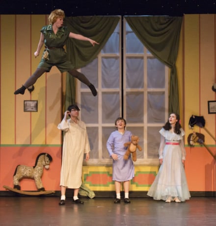 Peter Pan (Kelsey Meiklejohn) and the Darlings. Photo by Peter Hill.