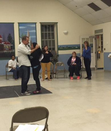 The cast in rehearsal for 'The Meeting.'