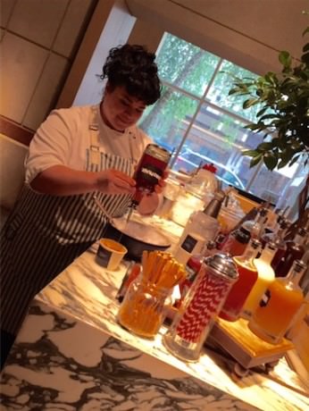 Executive Pastry Chef Naomi Gallego makes snow cones.