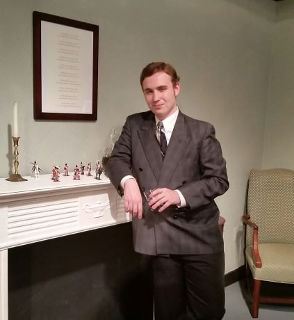 Anthony Marston (William Stiles) examines the 10 Little Soldiers on the mantelpiece. Photo by Richard Atha-Nicholls.