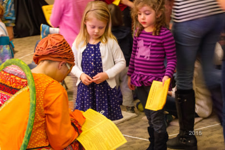 Children line up for autographs at Pumpkin Theatre after the show. Photo by Sean Berenholtz.