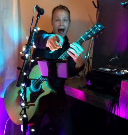 Local musician Phil Kominski on the rooftop Lotus Lounge at Urban Heights.