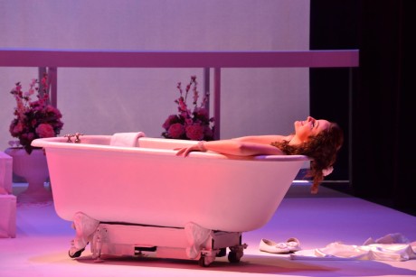 Lydia (Emily Smith) enjoys a bath upon arrival in Italy. Photo by Emily Pound.