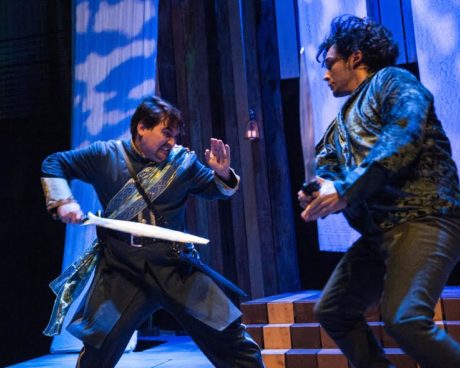 Passed over for promotion, Iago (Jose Guzman) plots a revenge against Othello and promises to win Othello’s wife for Roderigo (Elliott Kashner). Photo by Teresa Castracane.