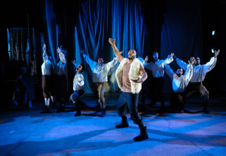 Forrest McClendon (The Cook) and the ensemble. Photo by Shawn May.