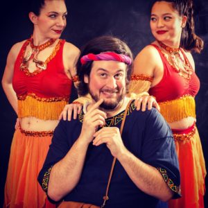 Bob Gudauskas (Pseudolus) with Courtesans Allie Press and Kelly Nguyen. Photo by Russell Wooldridge.