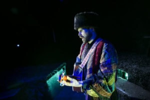 Matthew Schleigh as Singer in The Caucasian Chalk Circle. Photo by Daniel Schwartz.