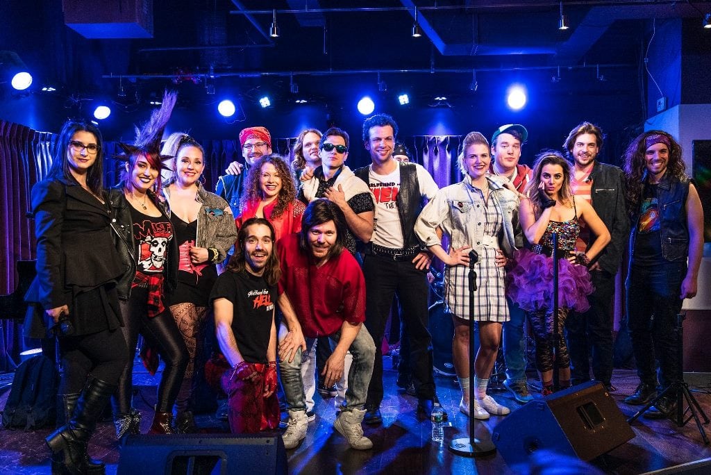 Rachel Klein (left), Sean Matthew Whiteford (kneeling, left front), and the cast. Photo by Matt Yeager.