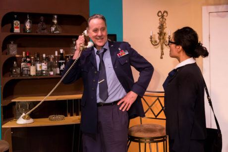 Colonel Brooks (Sandy Irving) meets FBI agent MK (Joy Liu) in Greenbelt Arts Center's production of 'The Honey Trap.' Photo by Kimberly Curren.